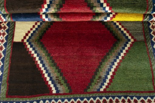 Full view of 2000s Persian Gabbeh rug from Iran / Persia, 170 × 110 cm in Multi Color tones