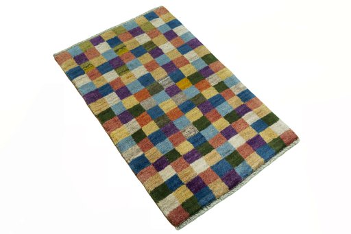 Close-up detail of 2000s Persian Gabbeh rug from Iran / Persia showing Wool weave