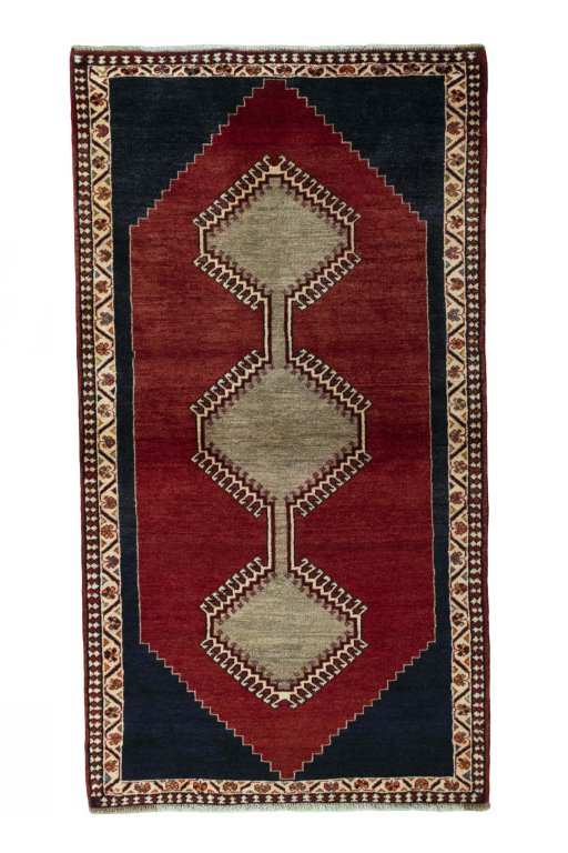 Full view of 2000s Persian Gabbeh rug from Iran / Persia, 195 × 105 cm in Red tones
