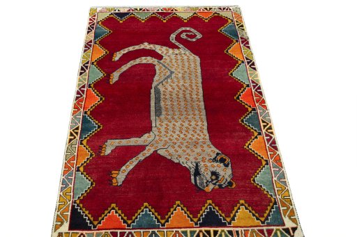 Surface texture of 2000s Persian Gabbeh rug with natural Wool and intricate pattern