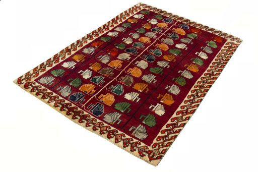 Corner detail of 2000s Persian Gabbeh rug showing border pattern and Wool pile