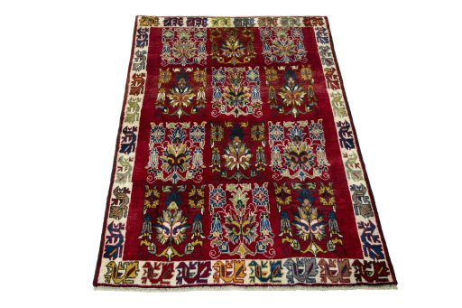 Surface texture of 2000s Persian Gabbeh rug with natural Wool and intricate pattern