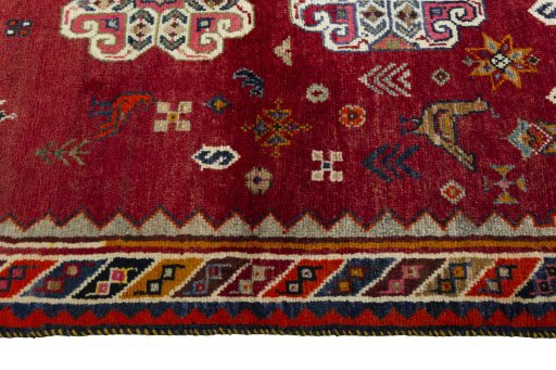Full view of 2000s Persian Gabbeh rug from Iran / Persia, 175 × 105 cm in Red tones