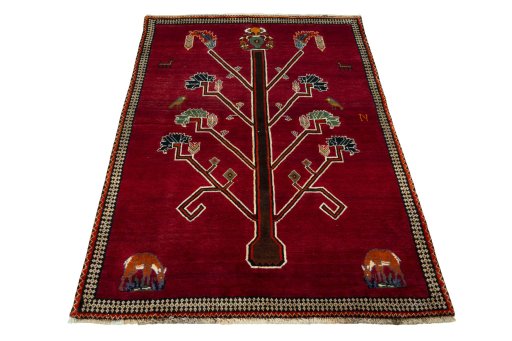 Surface texture of 2000s Persian Gabbeh rug with natural Wool and intricate pattern