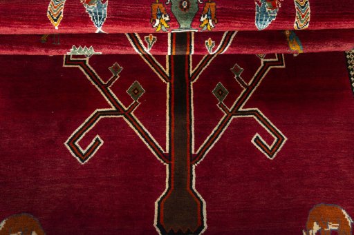 Full view of 2000s Persian Gabbeh rug from Iran / Persia, 208 × 138 cm in Red tones