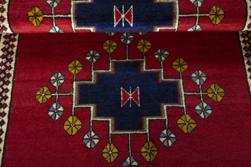 Full view of 2000s Persian Gabbeh rug from Iran / Persia, 163 × 103 cm in Red tones