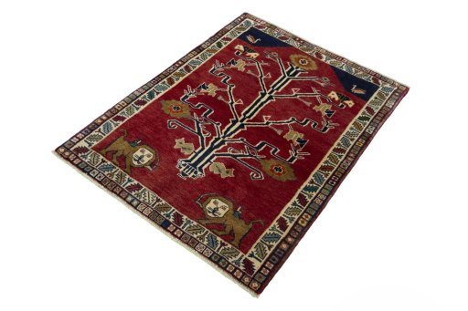 Corner detail of 2000s Persian Gabbeh rug showing border pattern and Wool pile