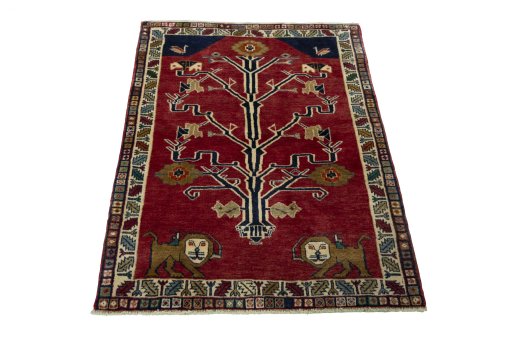 Surface texture of 2000s Persian Gabbeh rug with natural Wool and intricate pattern