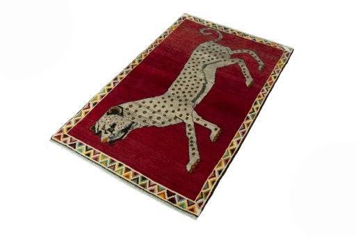 Corner detail of 2000s Persian Gabbeh rug showing border pattern and Wool pile