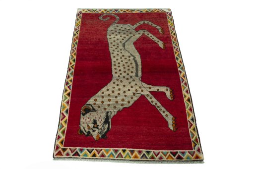 Surface texture of 2000s Persian Gabbeh rug with natural Wool and intricate pattern