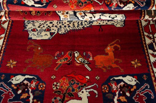 Full view of 2000s Persian Gabbeh rug from Iran / Persia, 267 × 163 cm in Red tones