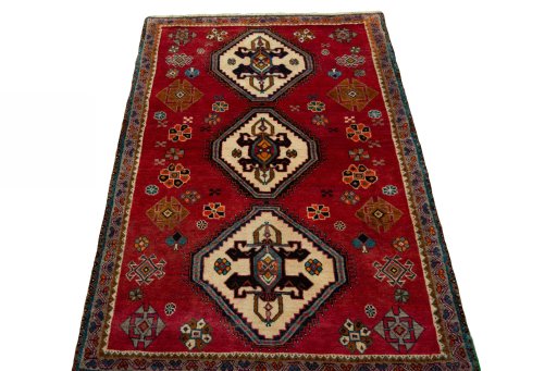 Surface texture of 2000s Persian Gabbeh rug with natural Wool and intricate pattern