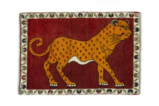 Full view of 2000s Persian Gabbeh rug from Iran / Persia, 93 × 65 cm in Red tones