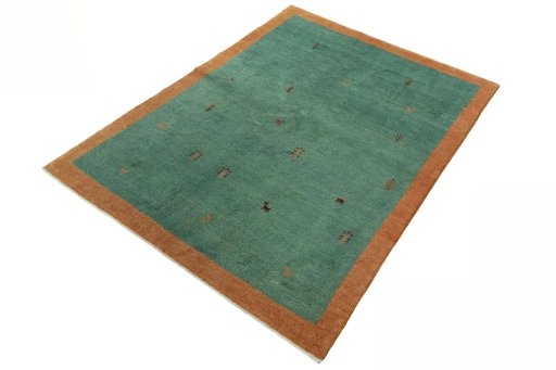 Corner detail of New Persian Gabbeh rug showing border pattern and Wool pile