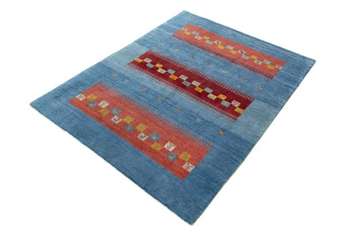 Corner detail of New Persian Gabbeh rug showing border pattern and Wool pile