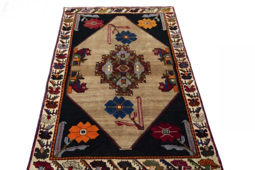 Surface texture of 2000s Persian Gabbeh rug with natural Wool and intricate pattern