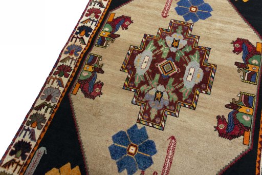 Backside of handmade 2000s Persian Gabbeh rug showing knot structure and weave density