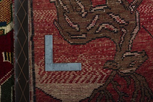 Surface texture of 2000s Persian Gabbeh rug with natural Wool and intricate pattern