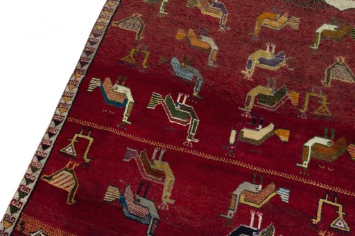 Backside of handmade 2000s Persian Gabbeh rug showing knot structure and weave density