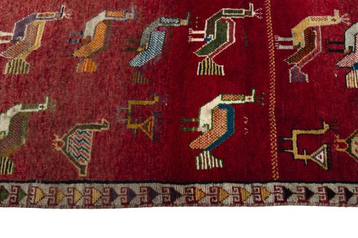 Full view of 2000s Persian Gabbeh rug from Iran / Persia, 204 × 106 cm in Red tones