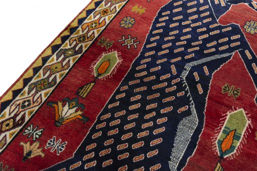 Backside of handmade 2000s Persian Gabbeh rug showing knot structure and weave density