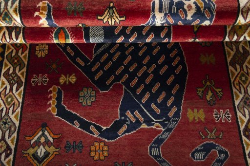 Full view of 2000s Persian Gabbeh rug from Iran / Persia, 203 × 121 cm in Red tones