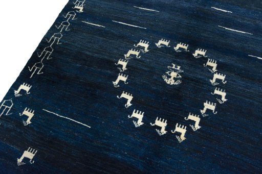Backside of handmade 2000s Persian Gabbeh rug showing knot structure and weave density