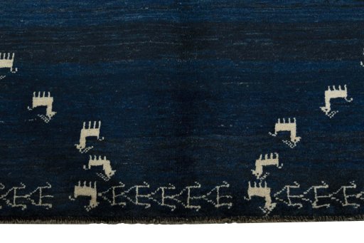 Close-up detail of 2000s Persian Gabbeh rug from Iran / Persia showing Wool weave
