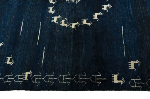 Full view of 2000s Persian Gabbeh rug from Iran / Persia, 218 × 168 cm in Blue tones