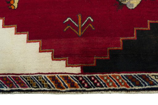 Central medallion detail of 2000s Persian Gabbeh rug from Iran / Persia