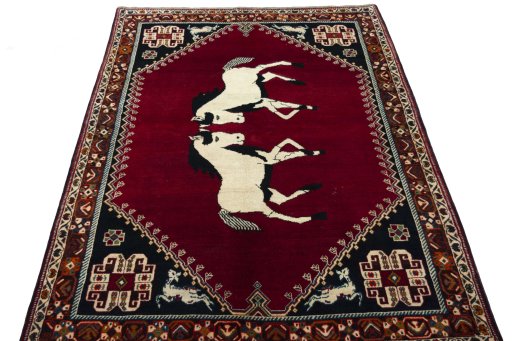 Surface texture of 2000s Persian Gabbeh rug with natural Wool and intricate pattern