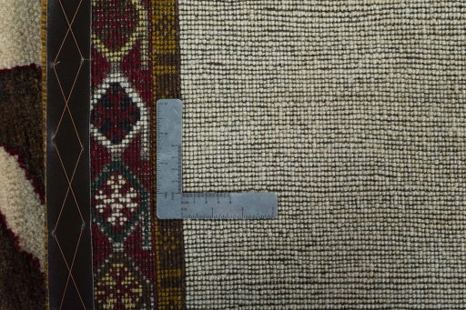 Close-up detail of 2000s Persian Gabbeh rug from Iran / Persia showing Wool weave