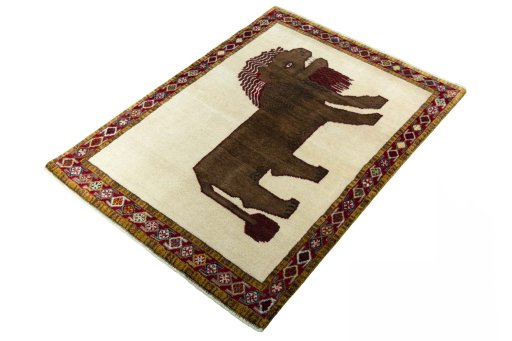 Corner detail of 2000s Persian Gabbeh rug showing border pattern and Wool pile