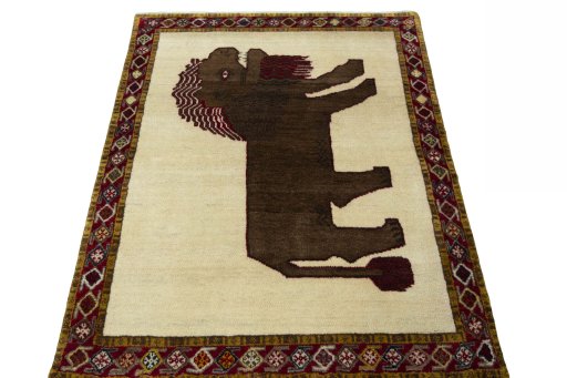 Surface texture of 2000s Persian Gabbeh rug with natural Wool and intricate pattern