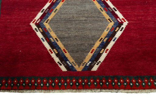 Central medallion detail of 2000s Persian Gabbeh rug from Iran / Persia