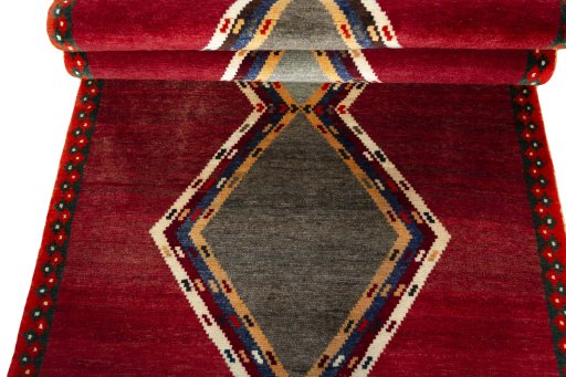 Full view of 2000s Persian Gabbeh rug from Iran / Persia, 208 × 116 cm in Red tones
