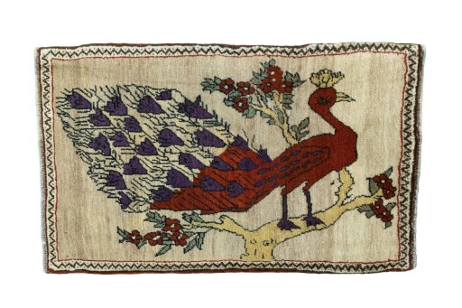 Full view of 2000s Persian Gabbeh rug from Iran / Persia, 100 × 62 cm in Beige tones