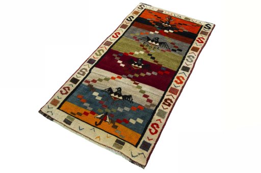 Corner detail of 2000s Persian Gabbeh rug showing border pattern and Wool pile
