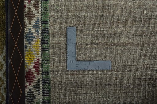 Close-up detail of 2000s Persian Gabbeh rug from Iran / Persia showing Wool weave