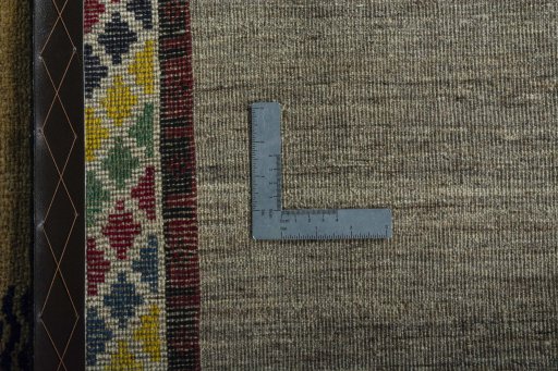Close-up detail of 2000s Persian Gabbeh rug from Iran / Persia showing Wool weave