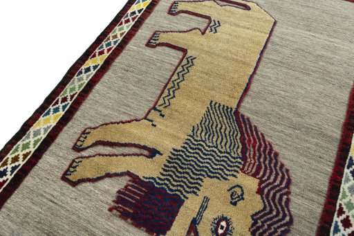 Backside of handmade 2000s Persian Gabbeh rug showing knot structure and weave density