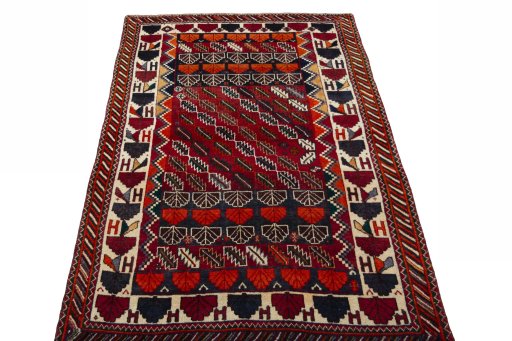 Surface texture of 2000s Persian Gabbeh rug with natural Wool and intricate pattern