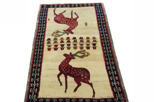 Surface texture of 2000s Persian Gabbeh rug with natural Wool and intricate pattern