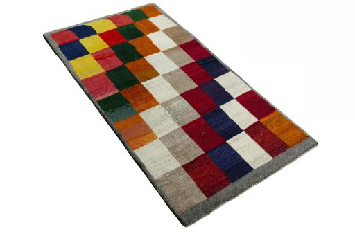 Close-up detail of 2000s Persian Gabbeh rug from Iran / Persia showing Wool weave