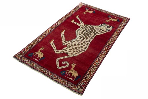 Corner detail of 2000s Persian Gabbeh rug showing border pattern and Wool pile