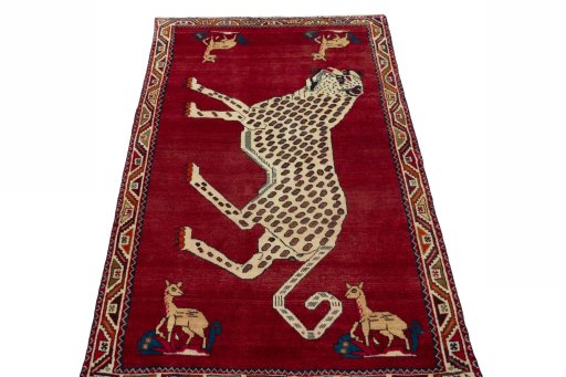 Surface texture of 2000s Persian Gabbeh rug with natural Wool and intricate pattern
