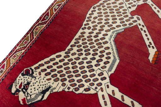 Backside of handmade 2000s Persian Gabbeh rug showing knot structure and weave density