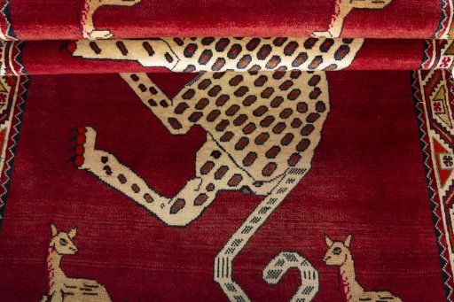 Full view of 2000s Persian Gabbeh rug from Iran / Persia, 208 × 118 cm in Red tones