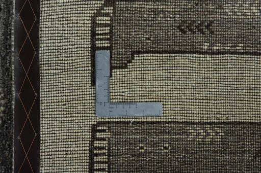 Close-up detail of 2000s Persian Gabbeh rug from Iran / Persia showing Wool weave