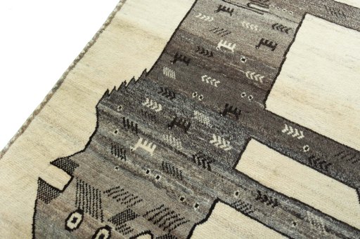 Backside of handmade 2000s Persian Gabbeh rug showing knot structure and weave density